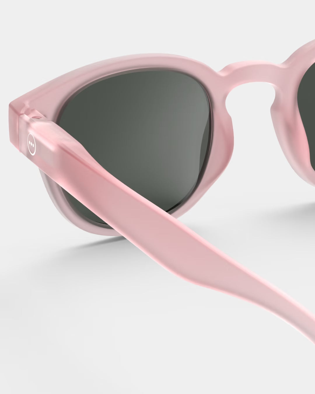 Pink IZIPIZI sunglasses for children aged 5-7, stylish fashion eyewear with pink frame and UV protection.
