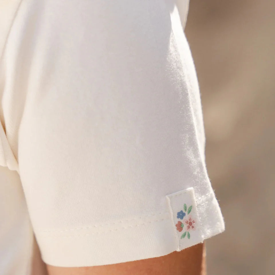 White short-sleeve toddler shirt with collar from Little Dutch's Forest Friends Fairy Garden summer collection.