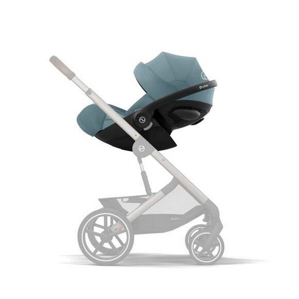 Cybex Cloud G i-Size Plus infant car seat in grey fabric with adjustable headrest and side impact protection.