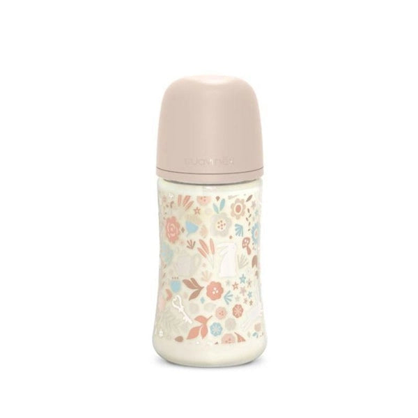 Suavinex Wonderland Liberty 270 ml pink baby bottle with playful design and soft nipple for infants.