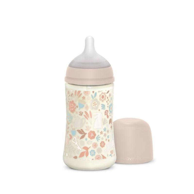 Suavinex Wonderland Liberty baby bottle in pink, 270 ml with colorful print and ergonomic design for infants.