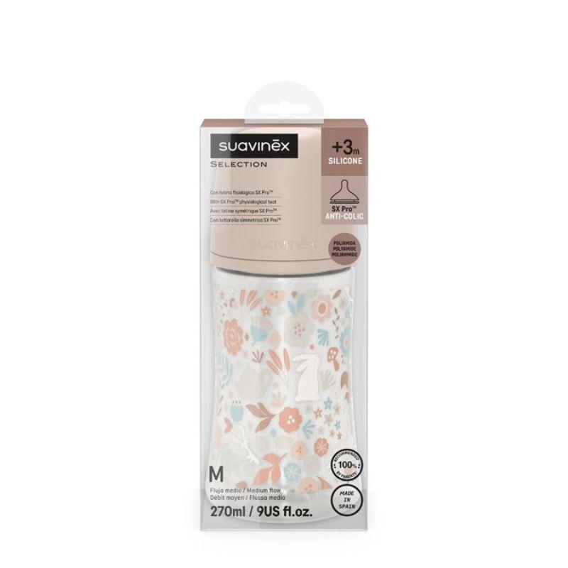 Pink Suavinex Wonderland Liberty baby bottle with 270 ml capacity, featuring colorful whimsical design and soft silicone nipple.