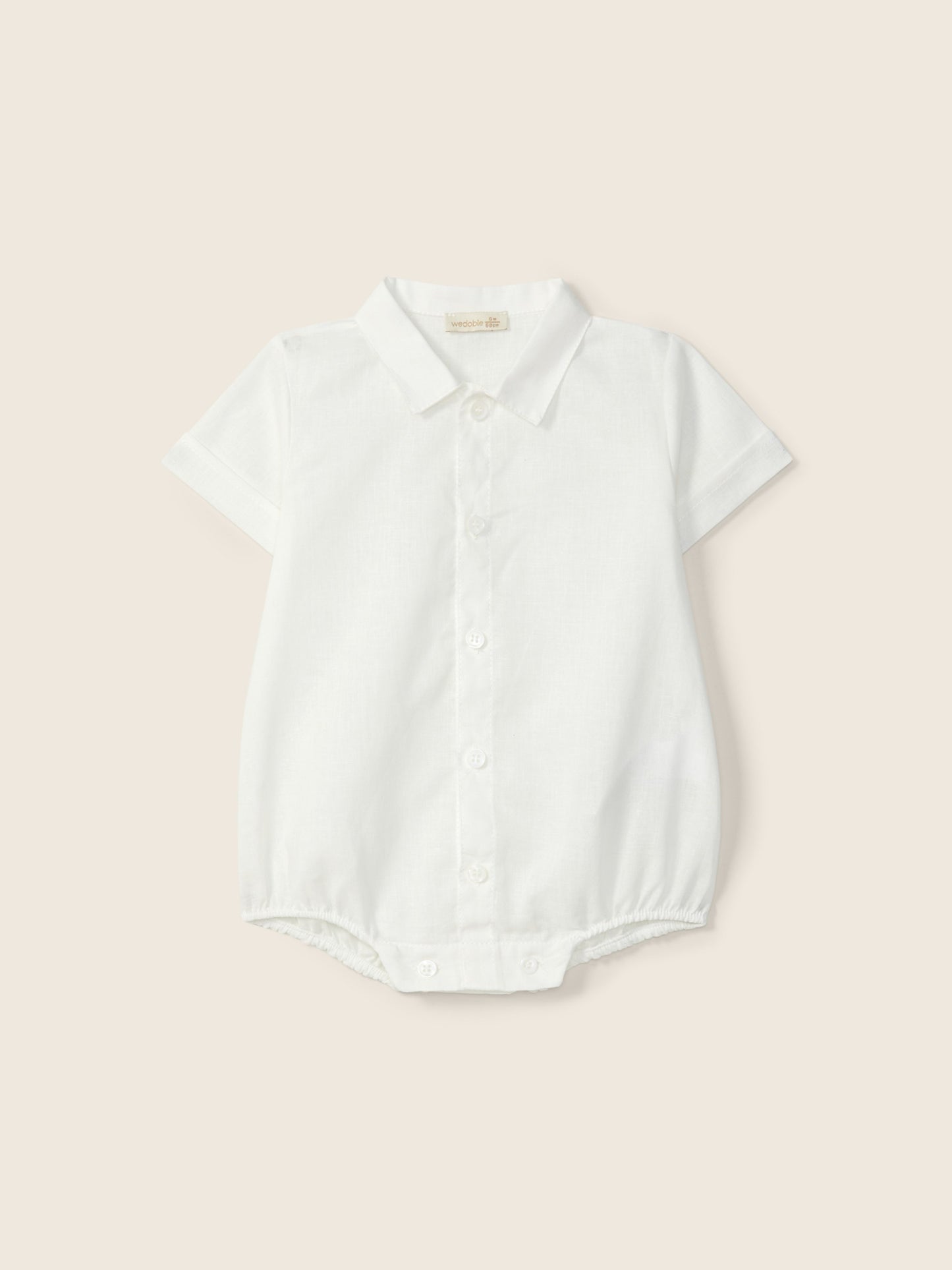 Palu short-sleeve baby bodysuit by Liste Nascita, featuring a comfortable design with playful print and soft fabric.