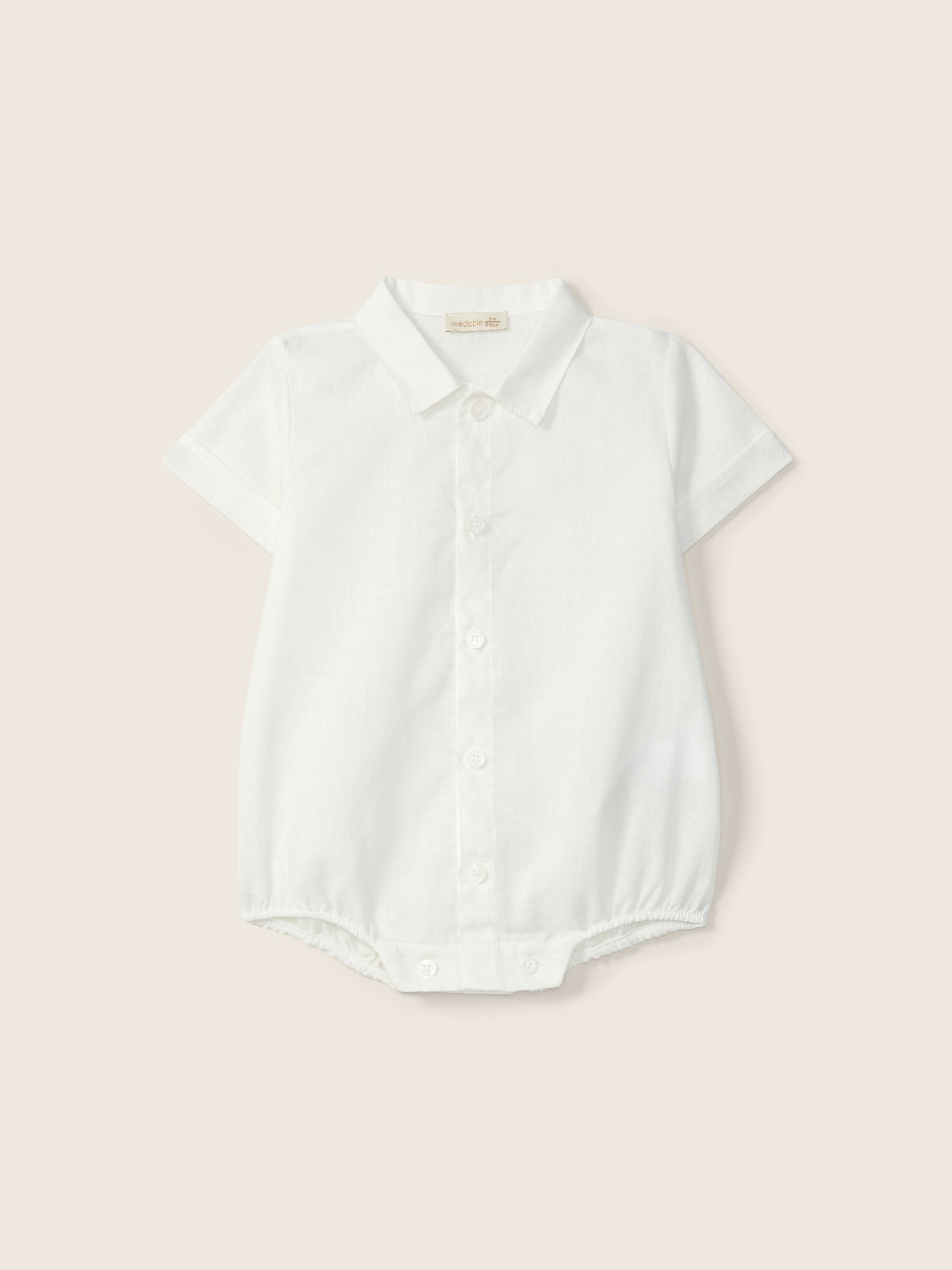 Palu short-sleeve baby bodysuit by Liste Nascita, featuring a comfortable design with playful print and soft fabric.