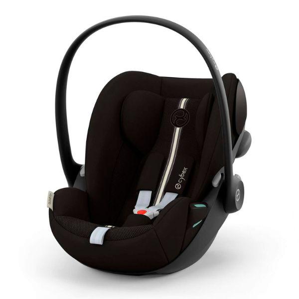Cybex Cloud G i-Size Plus infant car seat installed in a vehicle, featuring adjustable head support and safety harness.