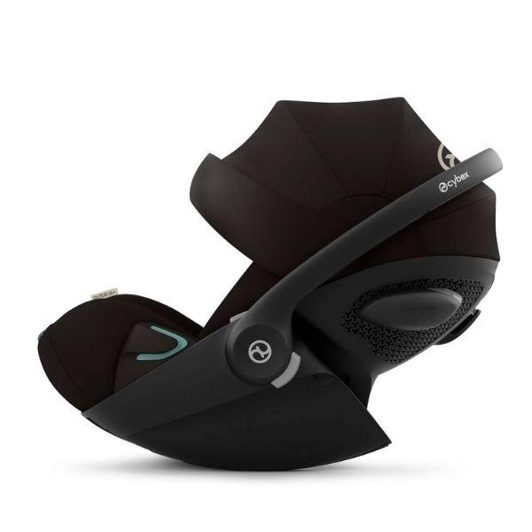 Cybex Cloud G i-Size Plus infant car seat with adjustable headrest, side impact protection, and padded interior for safety and comfort.