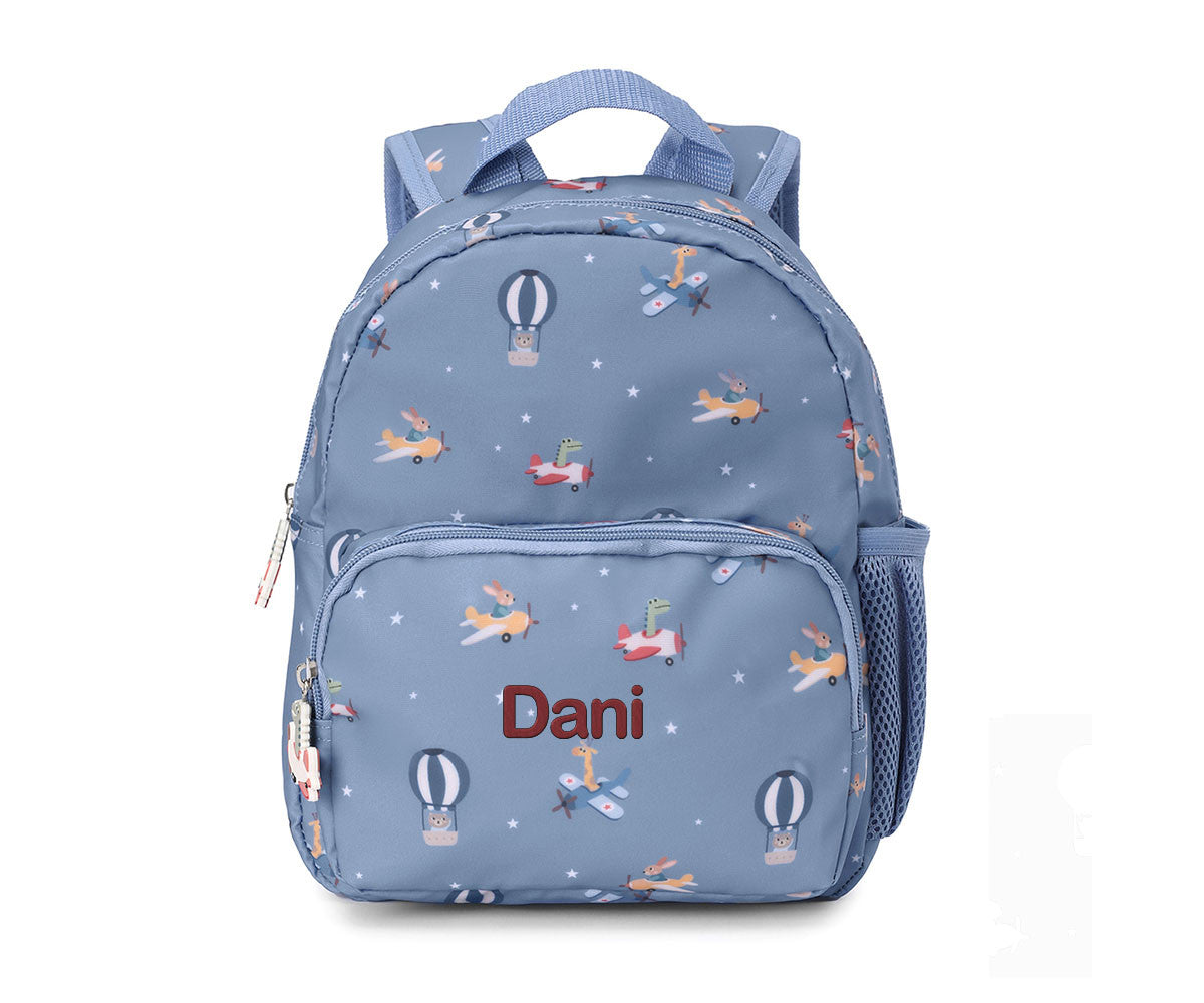 Personalized Tutete Planes backpack for back-to-school, featuring colorful airplane designs and adjustable straps.