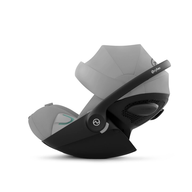 Cybex Cloud G i-Size Plus infant car seat with adjustable head support and safety harness, installed in a vehicle.