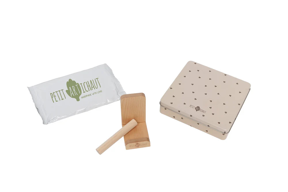 Square baby gift box by Petit Artichaut with heart designs, perfect for special occasions, shown in a close-up view.