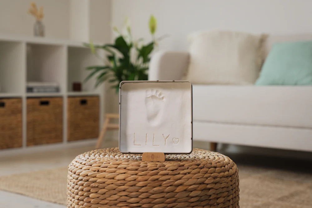 Square baby gift box by Petit Artichaut featuring cute heart designs, perfect for special occasions.