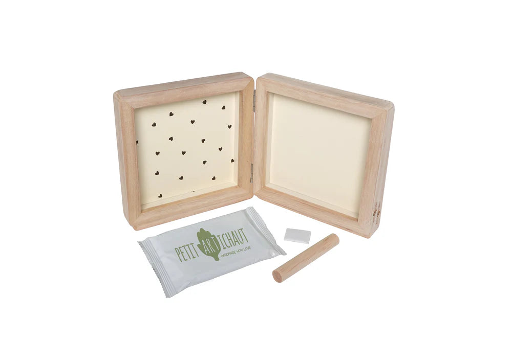 Decorative double heart picture frame by Petit Artichaut, featuring a charming design for wall decor.