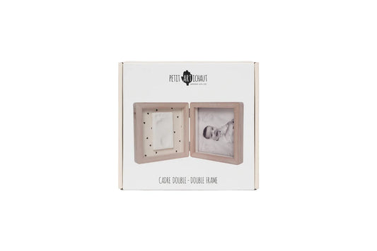 Set of nine Doppia Cornice Jolis Cœurs picture frames by Petit Artichaut with charming heart designs, ideal for wall decor.