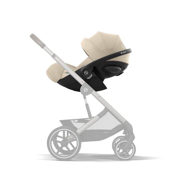 Cybex Cloud G i-Size Plus infant car seat with grey fabric and adjustable headrest, designed for safety and comfort.