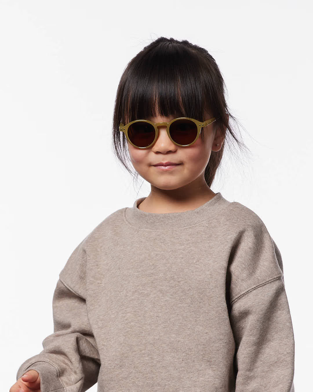 Children's IZIPIZI sunglasses for ages 3-5 in olive color, featuring a stylish and comfortable fashion design.